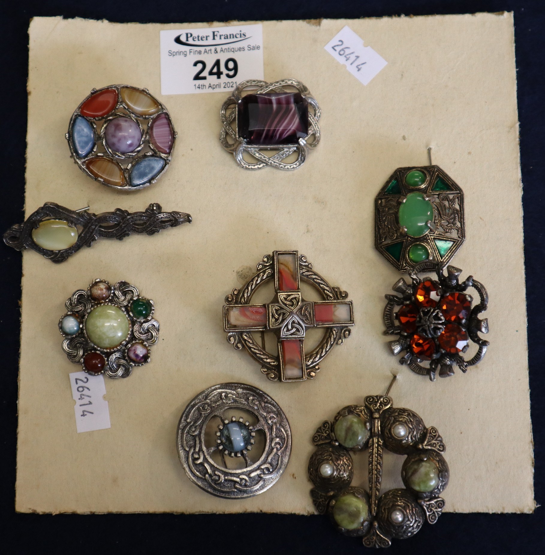 Lot 249 Collection of nine Scottish brooches with